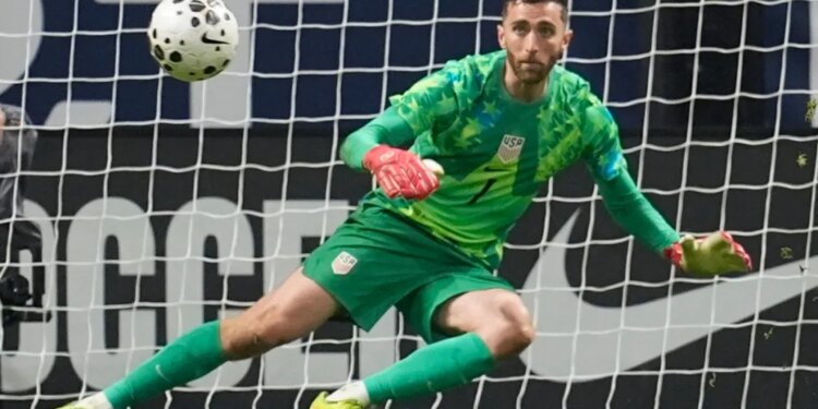 Matt Turner (1) eyes the ball on a shot from Belgium during the second half of an international friendly soccer match.