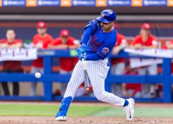 New York Mets Mike Tauchman hits a double in the third inning against the Washington Nationals during Spring Training Clover Field, Saturday, Feb. 28, 2026, in Port St. Lucie, FL.