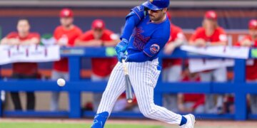 New York Mets Mike Tauchman hits a double in the third inning against the Washington Nationals during Spring Training Clover Field, Saturday, Feb. 28, 2026, in Port St. Lucie, FL.