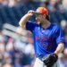 New York Mets pitcher Nolan McLean adjusts his hat after the fourth inning.
