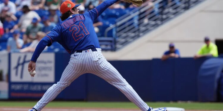 New York Mets pitcher Zach Thornton (21) pitches during a spring training game.