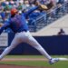 New York Mets pitcher Zach Thornton (21) pitches during a spring training game.