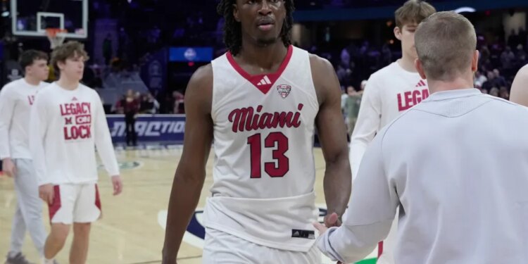 Antwone Woolfolk, a Miami forward, on the basketball court after a game.