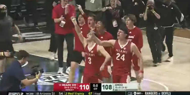 Miami Ohio players throw the bird to Ohio Bobcat fans after beating them in overtime to cap off an undefeated regular season.