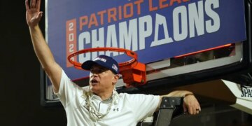 Lehigh Mountain Hawks head coach Brett Reed celebrates after winning the Patriot League Championship.