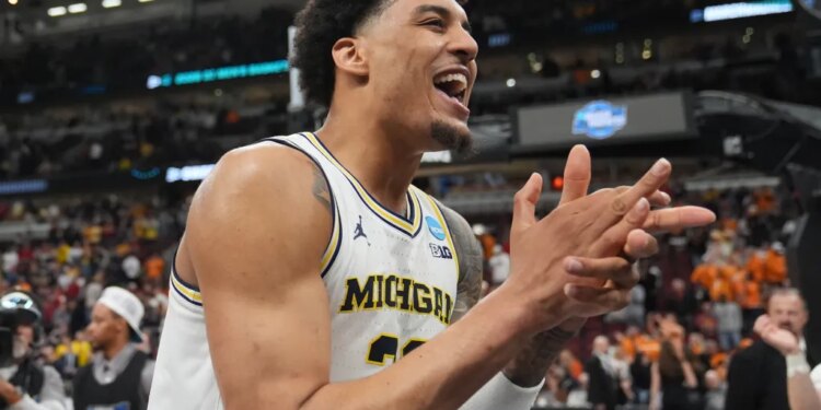 Yaxel Lendeborg of Michigan (23) celebrating after defeating Alabama.