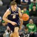 Washington Huskies forward Hannes Steinbach (6) dribbles the ball after a rebound during the second half against the Oregon Ducks at Matthew Knight Arena.