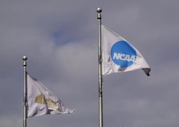 NCAA logo flags at the Hall of Champions in Indianapolis.