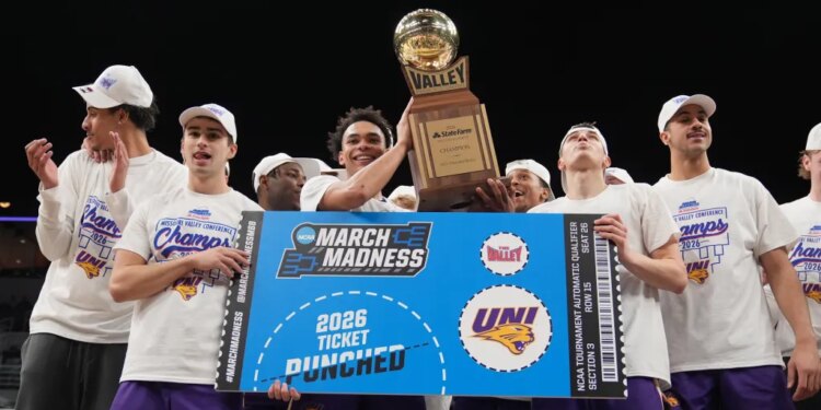 Trey Campbell and teammates celebrating their championship win and March Madness qualification.