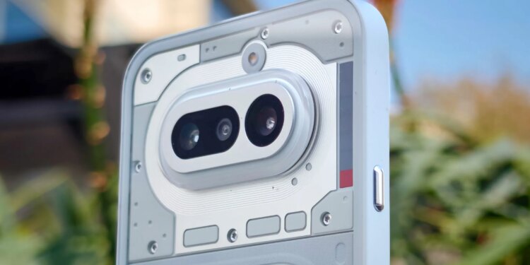 Photo of camera of Nothing Phone 4A in front of plants