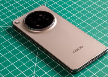 Photo of Oppo Find N6 on a green work mat from above at an angle, closed with the back facing up