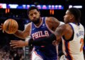 Philadelphia 76ers forward Paul George drives two the basket as New York Knicks guard Miles McBride defends in the first half at Madison Square Garden in Manhattan, New York, Saturday, January 03, 2026.