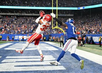 Kansas City Chiefs cornerback Jaylen Watson intercepts a pass intended for New York Giants wide receiver Malik Nabers.