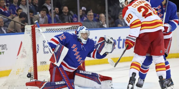 Rangers goaltender Jonathan Quick #32 deflects the puck during the second period.