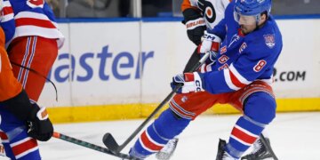 New York Rangers center J.T. Miller (8) takes a shot during the first period when the New York Rangers played the Philadelphia Flyers Thursday, February 26, 2026
