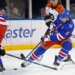 New York Rangers center J.T. Miller (8) takes a shot during the first period when the New York Rangers played the Philadelphia Flyers Thursday, February 26, 2026