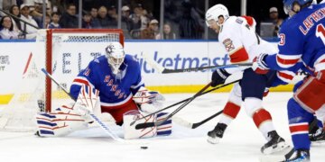 New York Rangers goaltender Igor Shesterkin makes a save on a shot by the Florida Panthers defenseman Dmitry Kulikov (C) in the first second at Madison Square Garden. New York, USA, Sunday, March 29, 2026.