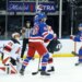 New York Rangers left wing Will Cuylle (50) reacts after defenseman Vladislav Gavrikov (44) scores a goal past New Jersey Devils goaltender Jacob Markstrom (25).