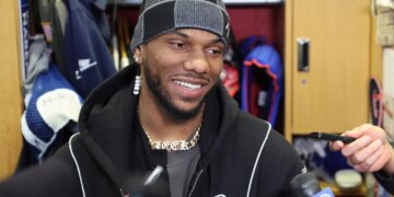 Malik Nabers speaking to media at the New York Giants training facility.