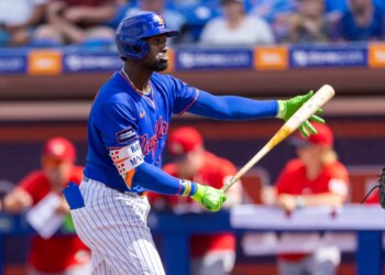 Ronny Mauricio of the New York Mets preparing to bat during spring training.