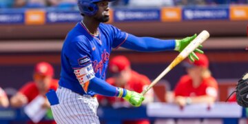 Ronny Mauricio of the New York Mets preparing to bat during spring training.
