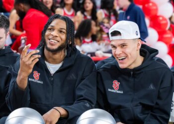 St. John's Red Storm Forward Zuby Ejiofor and Guard Dylan Darling watching the NCAA Men’s Basketball Tournament Selection Show.