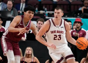 March 9, 2026; Las Vegas, NV, USA; Saint Mary's Gaels forward Paulius Murauskas (23) dribbles the basketball against Santa Clara Broncos guard Christian Hammond (1) during the first half at Orleans Arena. Mandatory Credit: Kyle Terada-Imagn Images