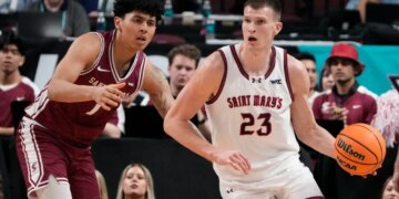 March 9, 2026; Las Vegas, NV, USA; Saint Mary's Gaels forward Paulius Murauskas (23) dribbles the basketball against Santa Clara Broncos guard Christian Hammond (1) during the first half at Orleans Arena. Mandatory Credit: Kyle Terada-Imagn Images