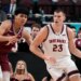 March 9, 2026; Las Vegas, NV, USA; Saint Mary's Gaels forward Paulius Murauskas (23) dribbles the basketball against Santa Clara Broncos guard Christian Hammond (1) during the first half at Orleans Arena. Mandatory Credit: Kyle Terada-Imagn Images