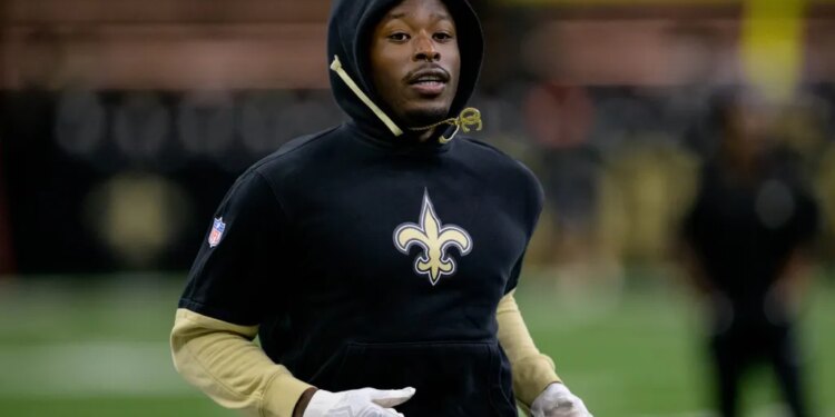 New Orleans Saints running back Alvin Kamara (41) warms up before a game against the Denver Broncos at Caesars Superdome.