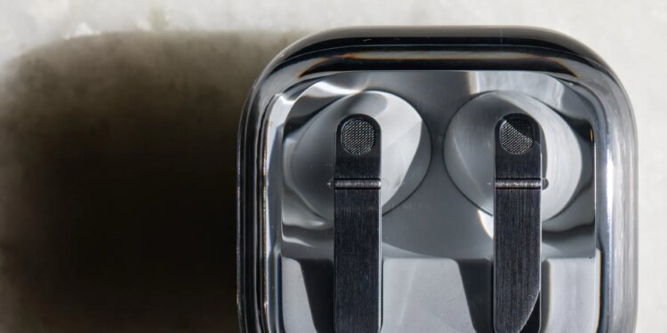 The Samsung Galaxy Buds 4 Pro in their charging case on a white tabletop.