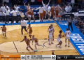 A basketball game with 1.0 seconds left on the clock and the score tied at 66 between Texas and NC State in the NCAA First Four.