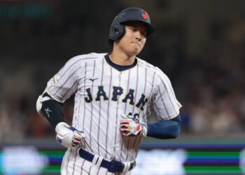 Japan's Shohei Ohtani rounds the bases after hitting a home run.