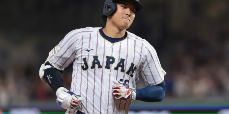 Japan's Shohei Ohtani rounds the bases after hitting a home run.