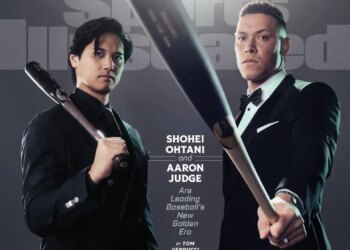 Shohei Ohtani and Aaron Judge in suits with baseball bats on a Sports Illustrated cover.