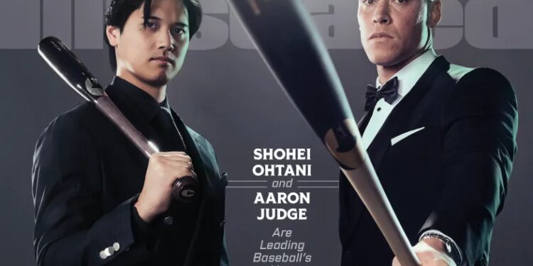 Shohei Ohtani and Aaron Judge in suits with baseball bats on a Sports Illustrated cover.