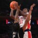 Ian Jackson, who scored 14 points,  shoots over Jamier Jones during St. John's 85-72 win over Providence in a Big East quarterfinal game on March 12, 2026 at the Garden.