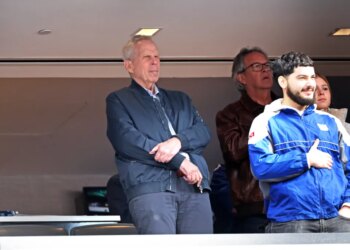 New York Giants co-owner Steve Tisch standing during the singing of the National Anthem at the start of the game.