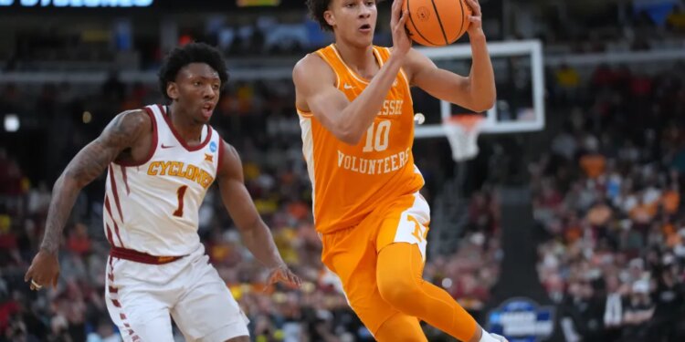 Nate Ament, who scored 18 points, looks to make a pass as Jamarion Batemon looks on during Tennessee's 76-62 win over Iowa State in their Sweet 16 matchup on March 27 2026.