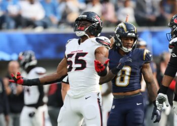 Houston Texans defensive end Danielle Hunter (55) celebrates after sacking Los Angeles Chargers quarterback Justin Herbert during the first half of an NFL football game Saturday, Dec. 27, 2025, in Inglewood, Calif.