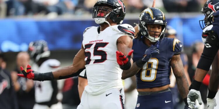 Houston Texans defensive end Danielle Hunter (55) celebrates after sacking Los Angeles Chargers quarterback Justin Herbert during the first half of an NFL football game Saturday, Dec. 27, 2025, in Inglewood, Calif.