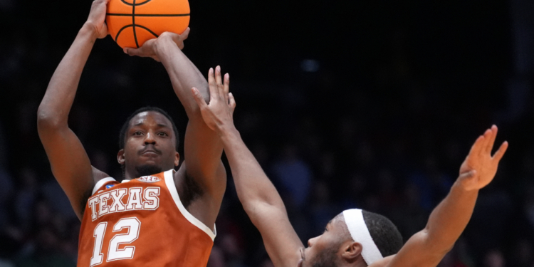 Tramon Mark hits a fadeaway jumper from just inside the 3-point line with 1.1 seconds left to lead Texas to a 68-66 win over N.C. State in a First Four matchup on March 17, 2026.