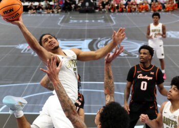 The Big 12 basketball tournament is ditching slippery LED courts for hardwood