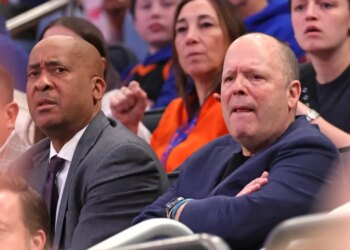 World Wide Wes and New York Knicks president Leon Rose watching the game.