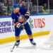 New York Islanders Tony DeAngelo looks to pass during the second period against the Calgary Flames at UBS Arena, Saturday, March 14, 2026.