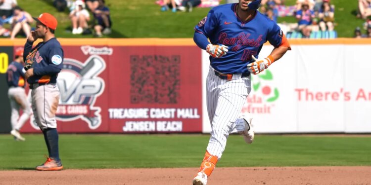 New York Mets left fielder Tyrone Taylor (15) rounds second base after hitting a home run against the Houston Astros.