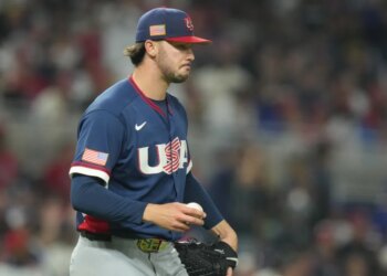 United States pitcher Paul Skenes walks back to the mound during a World Baseball Classic semifinal game.