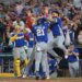 Ronald Acuña Jr. (21) and Gleyber Torres (25) react after Acuña scores in a World Baseball Classic semifinal game.
