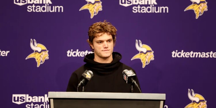 Minnesota Vikings quarterback J.J. McCarthy speaking at a news conference.