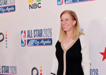 Cathy Engelbert smiling at the Los Angeles Clippers & Comcast NBCUniversal's NBA All-Star Legendary Tip-Off Celebration.